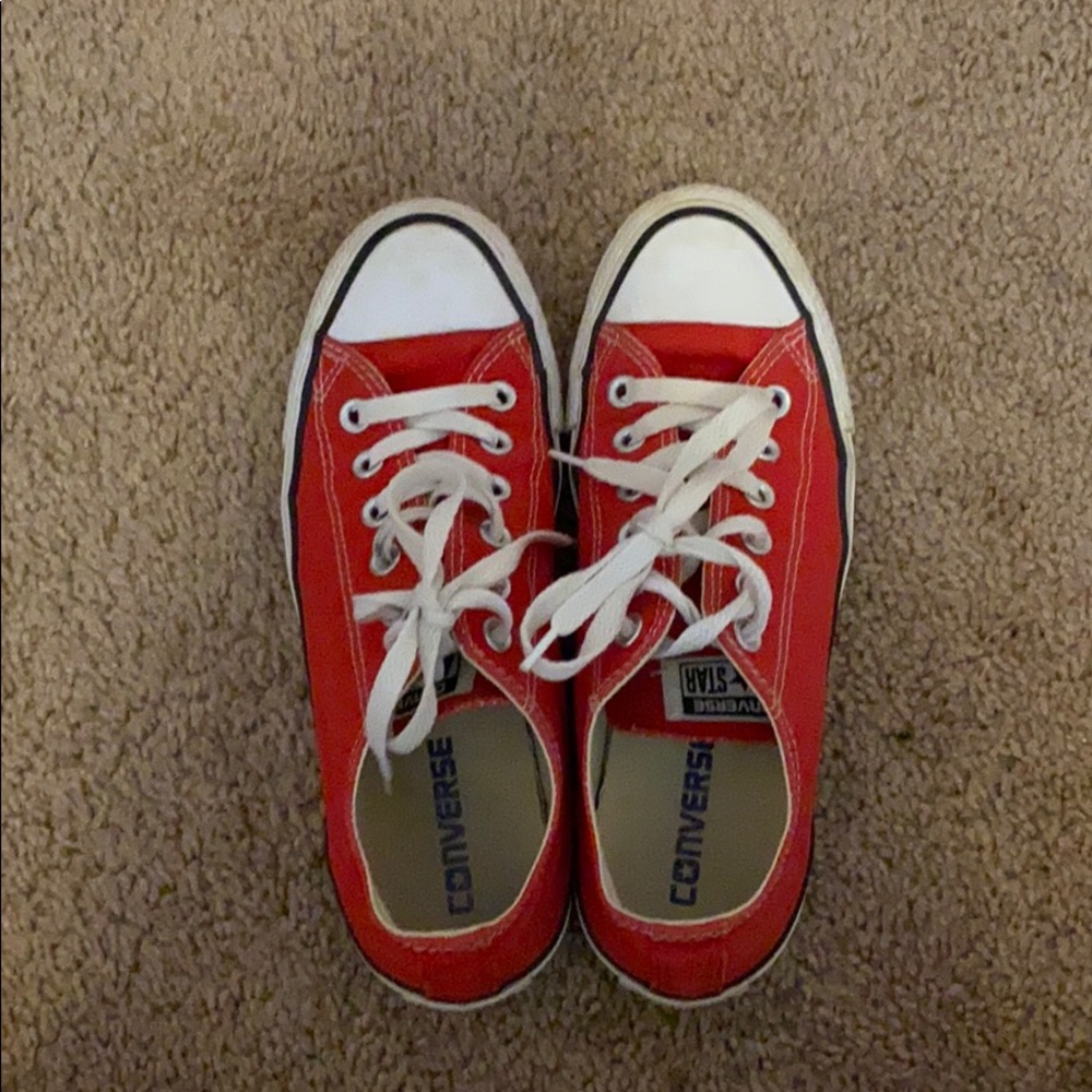 lightly used red and white converse